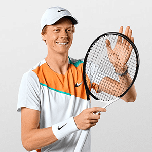 Jannik Sinner endorses the Nike Mens Tennis Tee - White/Hot Curry